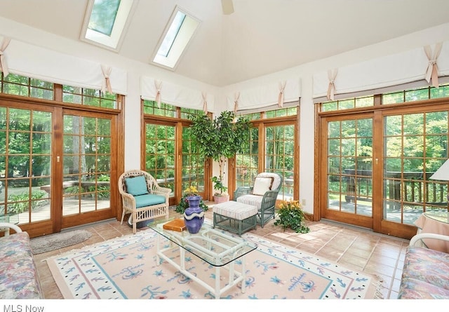 sunroom / solarium with french doors and vaulted ceiling with skylight