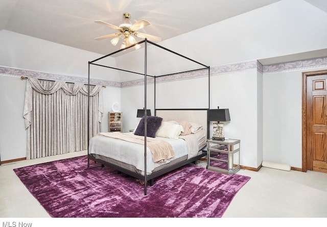 bedroom with carpet flooring, ceiling fan, and lofted ceiling