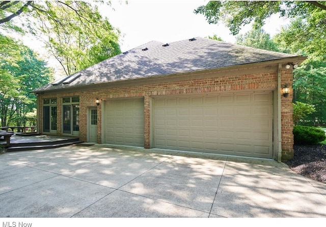 exterior space with a garage