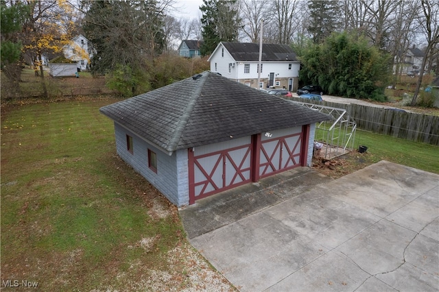 view of outdoor structure with a lawn