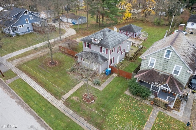 birds eye view of property with a residential view