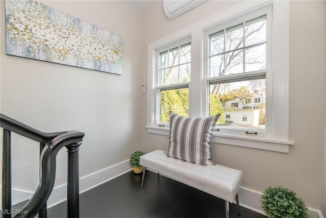 sitting room featuring hardwood / wood-style flooring