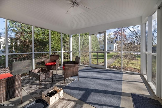 sunroom / solarium with ceiling fan