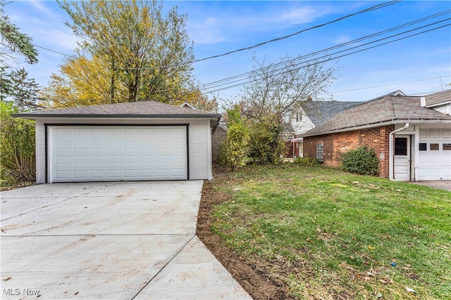 garage with a lawn