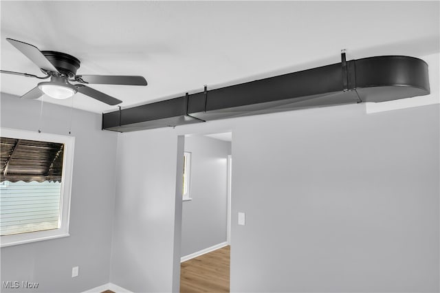 spare room with ceiling fan and hardwood / wood-style floors