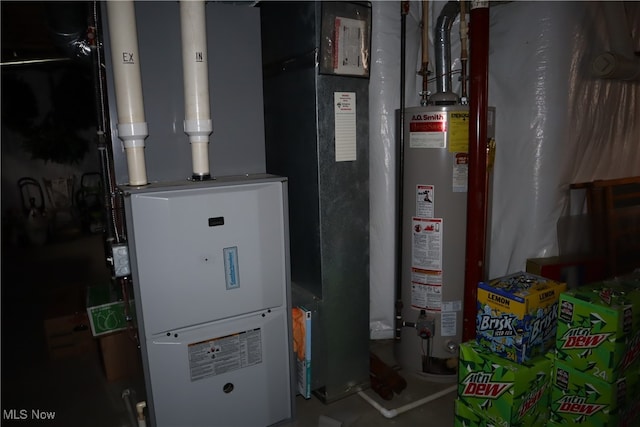 utility room featuring gas water heater