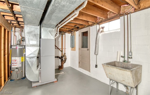 basement with sink, electric panel, heating unit, and water heater