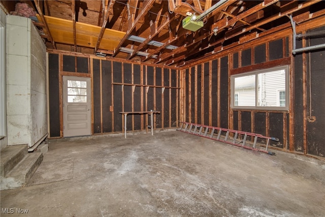 misc room with concrete flooring