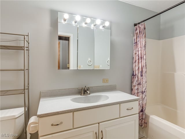 full bathroom with shower / tub combo, vanity, and toilet