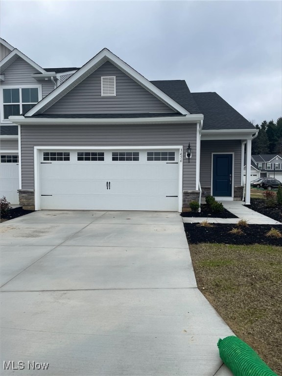 view of front of property featuring a garage