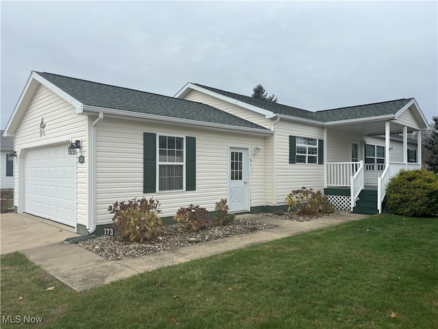 view of front facade with a garage, a porch, a front lawn, a shingled roof, and driveway