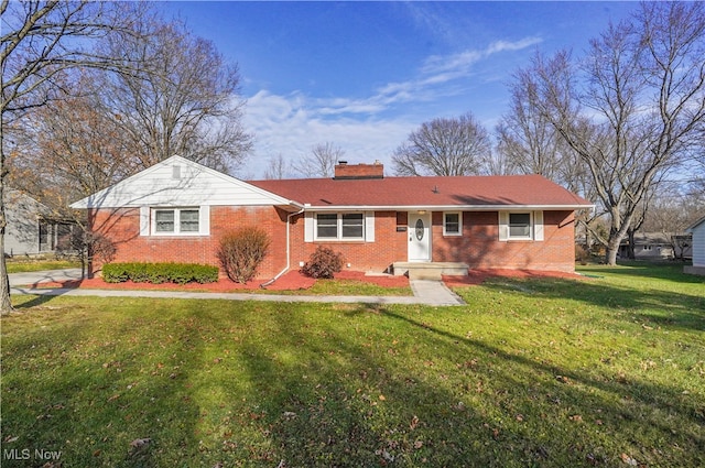 single story home featuring a front yard