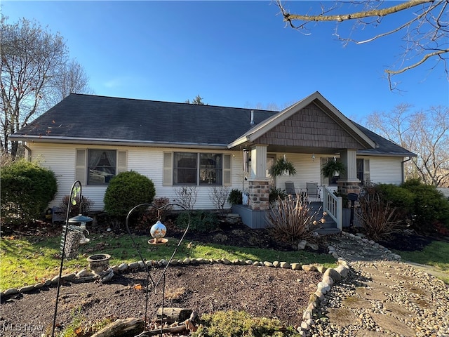 single story home with covered porch