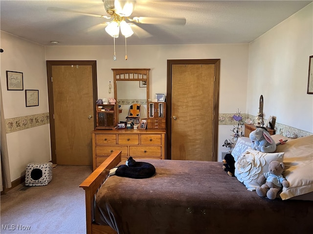 bedroom featuring carpet and ceiling fan