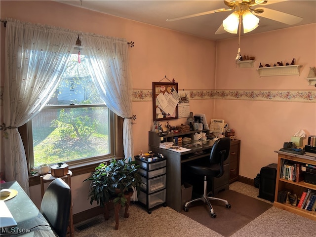 office area featuring carpet, a wealth of natural light, and ceiling fan