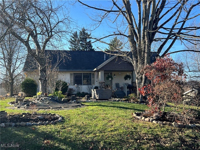 view of front facade with a front yard