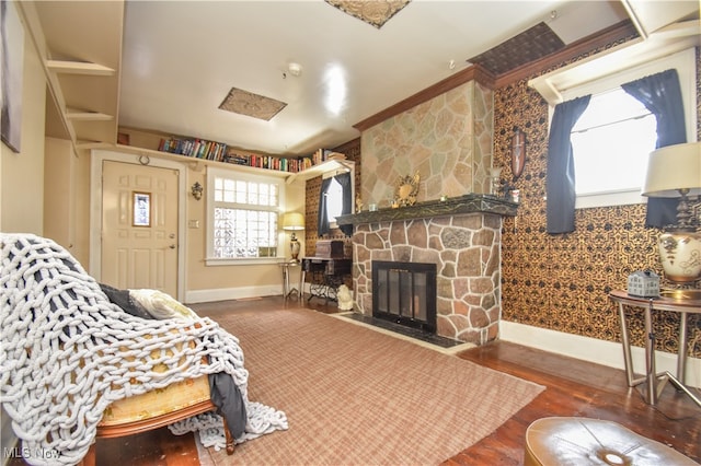 bedroom featuring a fireplace and dark wood-type flooring