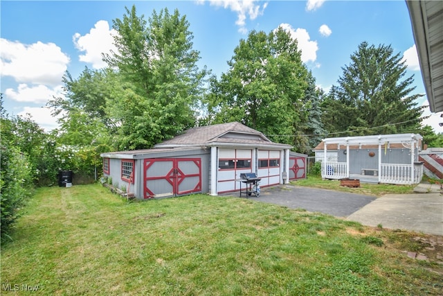 view of outdoor structure with a yard