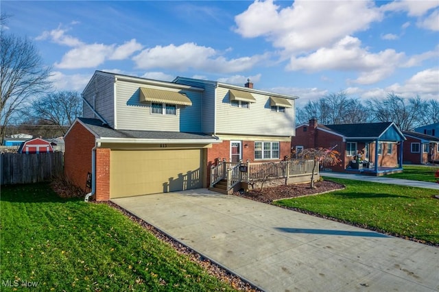 view of front property with a front lawn and a garage