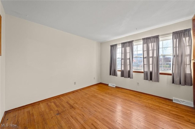 empty room featuring light hardwood / wood-style flooring