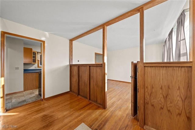 spare room featuring light hardwood / wood-style flooring