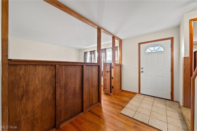 foyer with light wood-type flooring