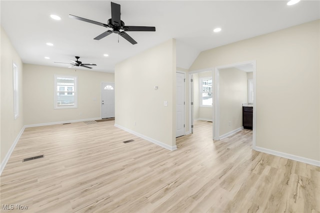 empty room featuring ceiling fan and light wood-type flooring