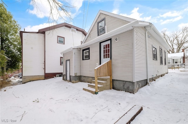 view of snow covered property