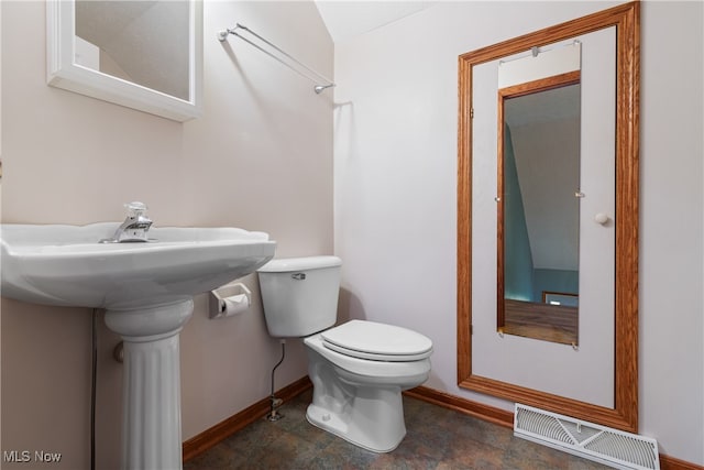 bathroom with sink and toilet