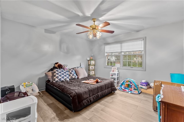 bedroom featuring ceiling fan and light hardwood / wood-style floors