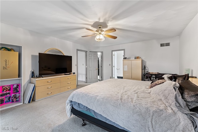 carpeted bedroom featuring ceiling fan