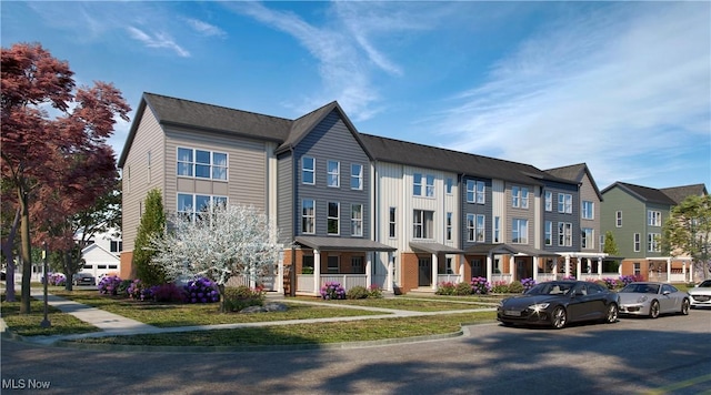 townhome / multi-family property featuring a residential view and a porch
