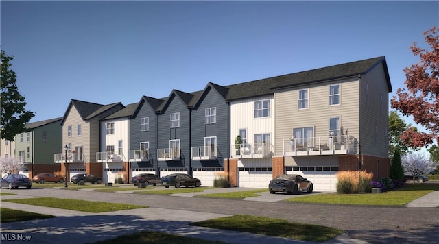 townhome / multi-family property with a garage, a residential view, and driveway