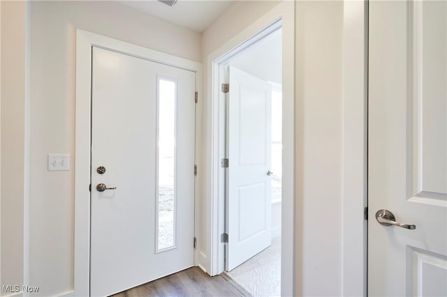 entrance foyer with wood finished floors