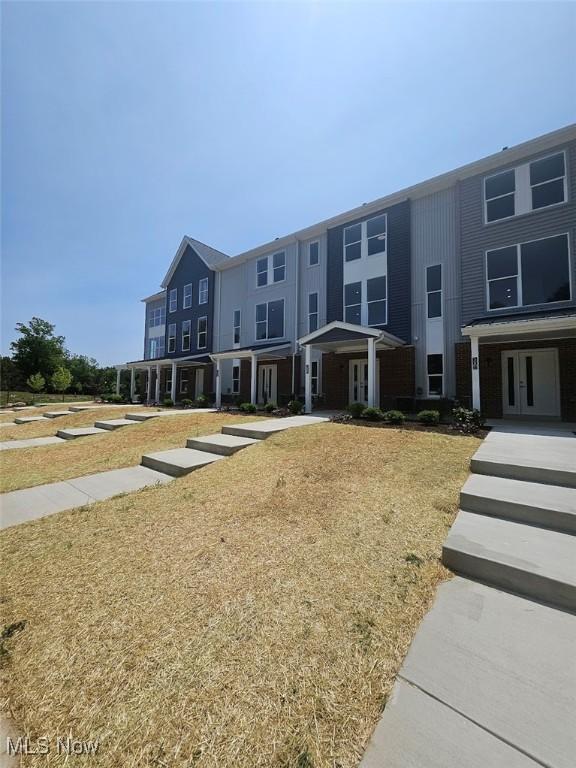 596 Mull Ave Unit 8, Akron, OH 44313 - multi unit property featuring french doors and a front lawn