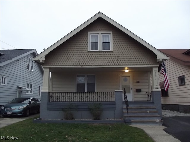 bungalow-style house with covered porch