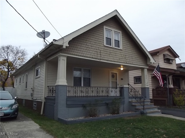 bungalow featuring covered porch