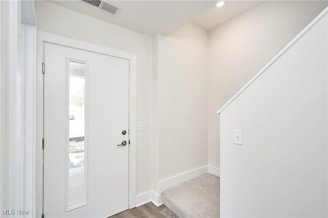 entrance foyer with visible vents, recessed lighting, baseboards, and wood finished floors