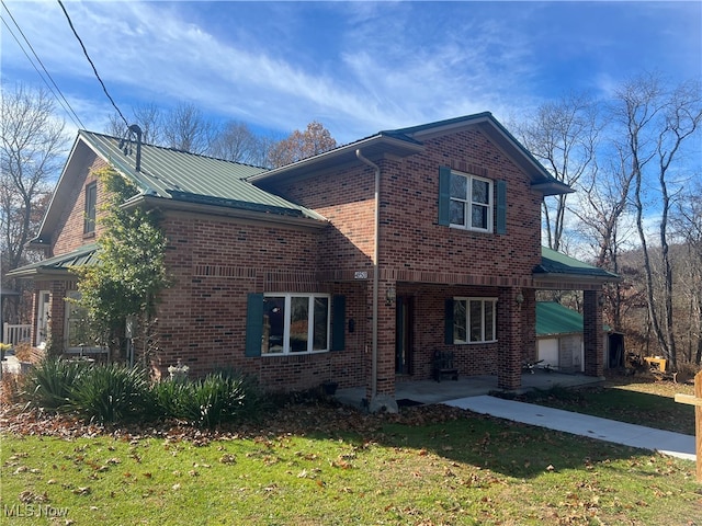 view of home's exterior with a lawn