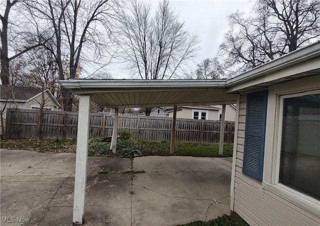 view of patio featuring a carport