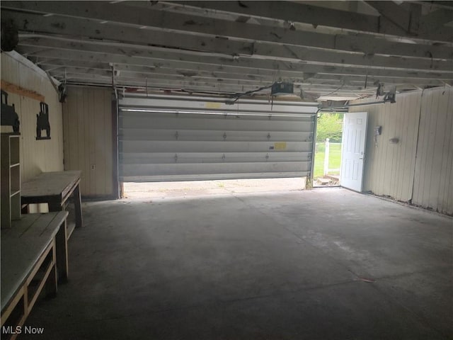 garage featuring a garage door opener