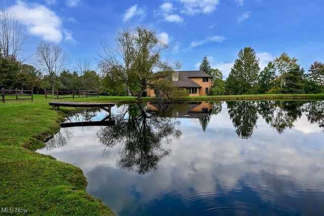 property view of water featuring a boat dock