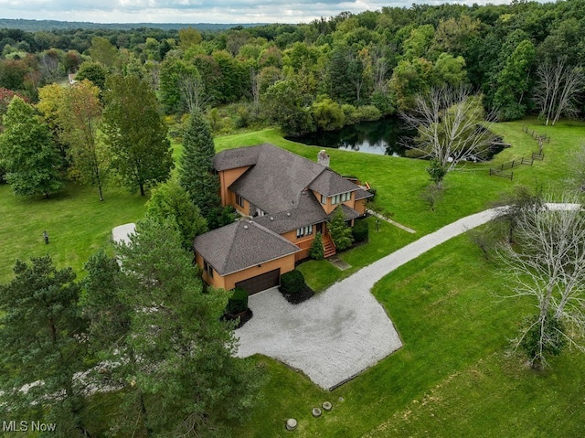 birds eye view of property featuring a water view