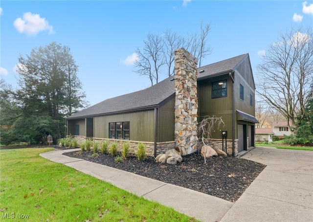 view of side of property featuring a garage