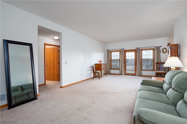 living room with light colored carpet