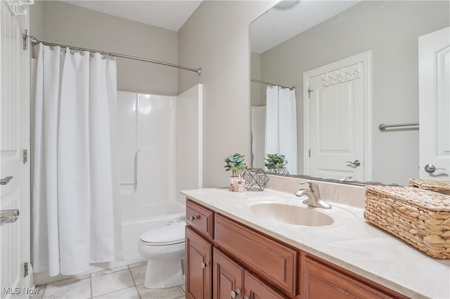 full bathroom featuring vanity, shower / tub combo, tile patterned floors, and toilet