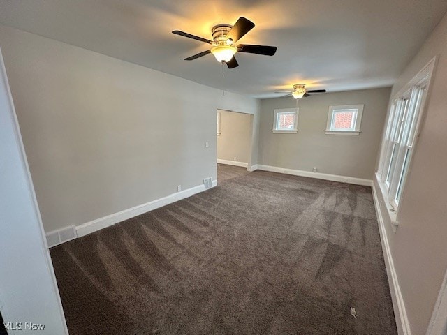 carpeted empty room with ceiling fan