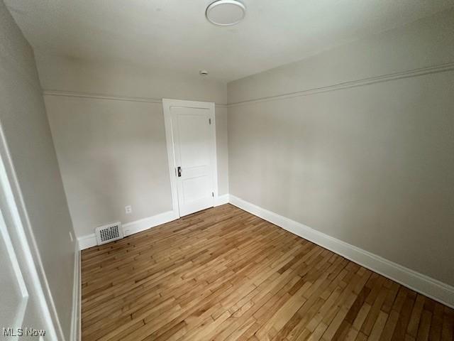 356 Babbitt Rd, Euclid, OH 44123 - spare room featuring wood finished floors and baseboards