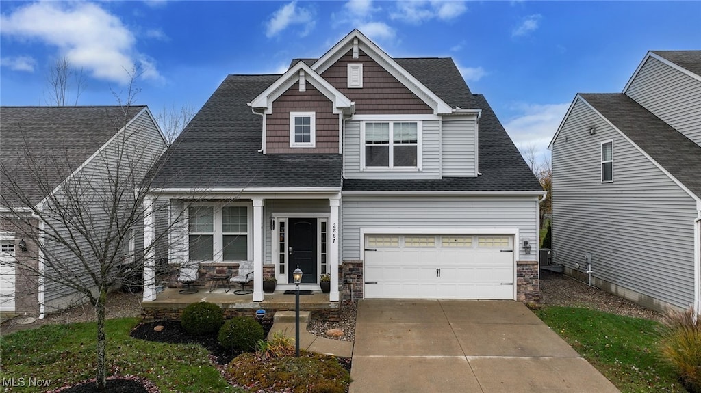 craftsman-style home with a garage