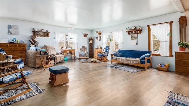 living area with light hardwood / wood-style flooring